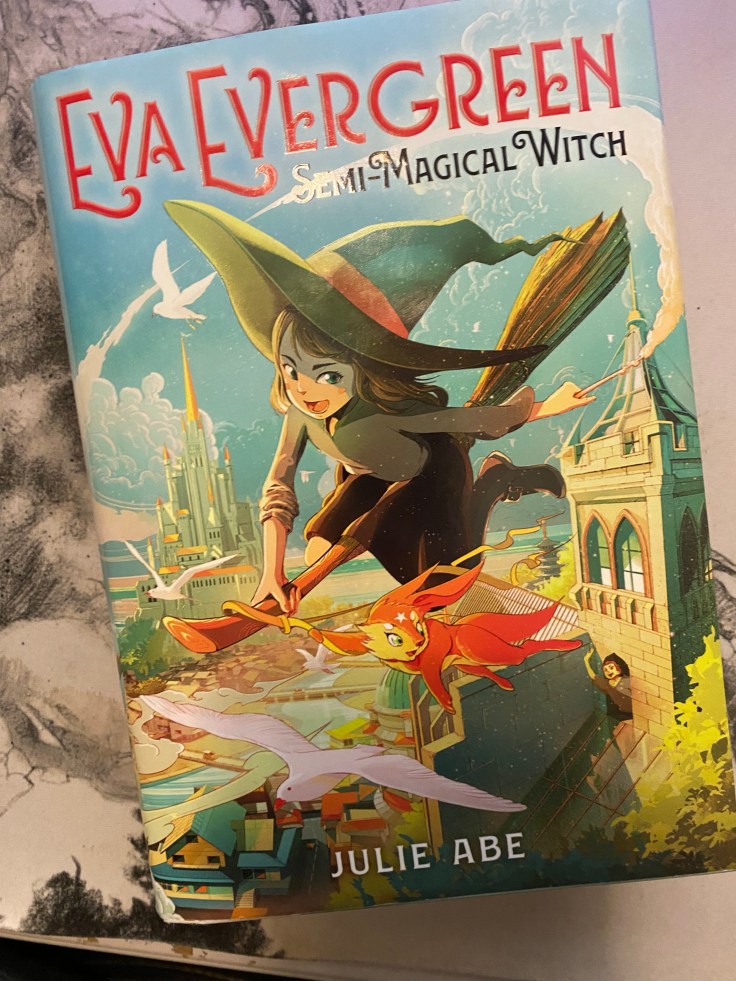 The cover to the middle grade fantasy, Eva Evergreen, Semi-Magical Witch, by Julie Abe
