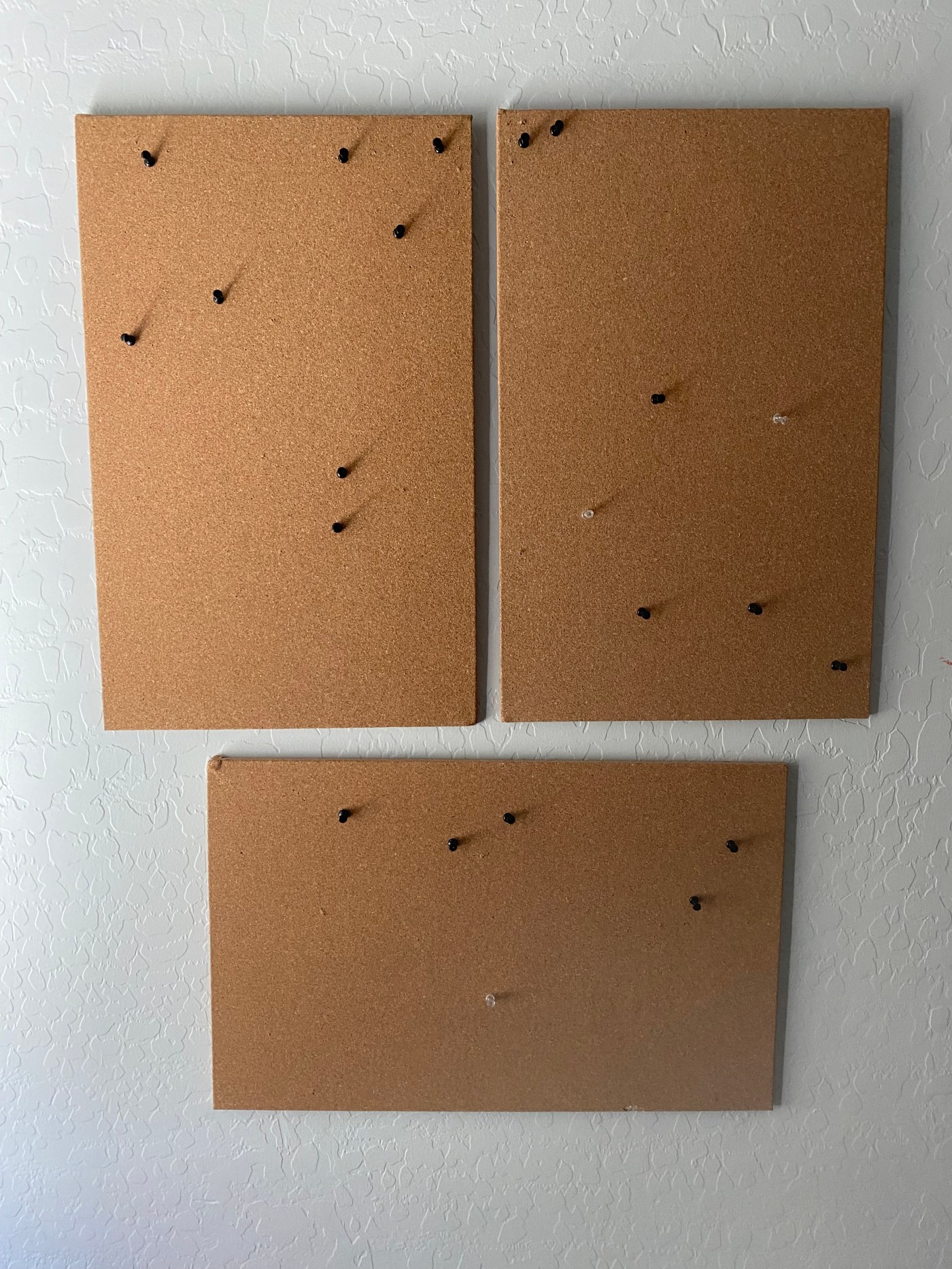 Empty cork boards hung on the wall.